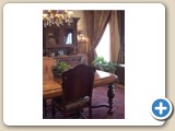 Dining Room with vintage waterfall dining table, large antique victorian carpet and large 1800's buffet