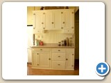 Kithcen with 1940's restored kitchen cabinets from gutted apartments in the house
